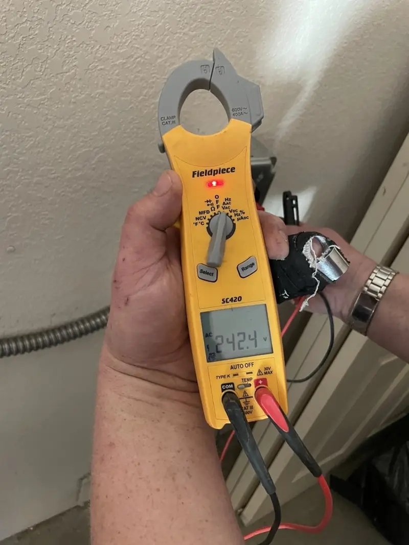Voltage testing with clamp meter during Electrical Installation Services in Silver Lakes